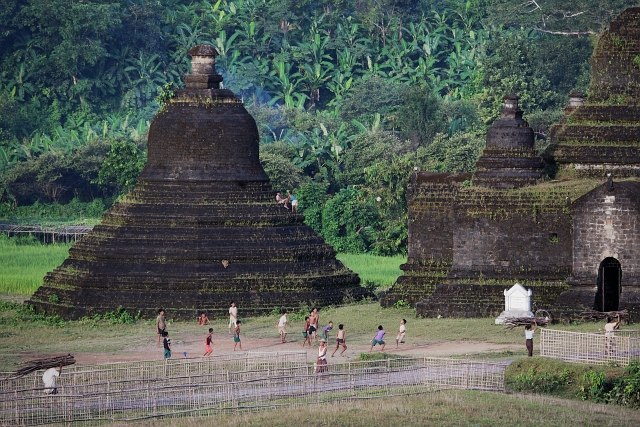 mrauk oo children playing football between temple ruins at sunset, evening, stupas, soccer, play ssbwa8v1561.jpg